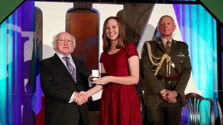  Arts/Law student, Matilda Gillis, is presented with her gold medal from the President of Ireland Mr Michael D. Higgins. Image supplied.
 
