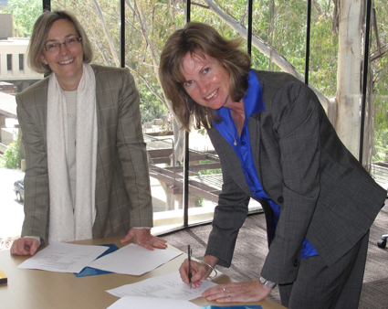 ANU College of Arts & Social Sciences Dean, Professor Toni Makkai, with the National Film & Sound Archive Acting CEO, Ann Landrigan, at the signing of a Memo of Understanding