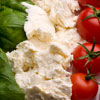 Three types of food arranged to mimic Italian flag in green, white and red