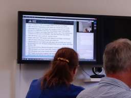 Students reading from Powerpoints during Dr Sanders' lecture