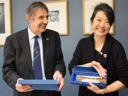 College interim Dean Professor Paul Pickering and Associate Dean (International) Professor Jacqueline Lo with NU gifts