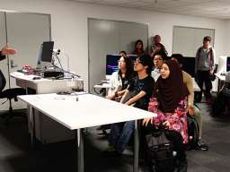 Republic Polytechnic students and Dr Bennett in music technology lab 