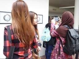 Students in the School of Art Foyer Gallery