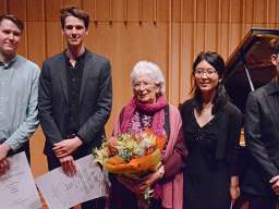 The four finalists onstage with Ms Christine Roach. Image by Peter Hislop.