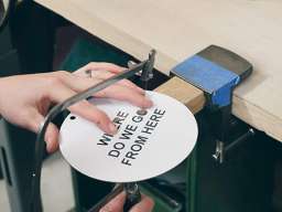 "I make my work by saw piercing/cutting out the text from thin aluminium sheet. On first glance the piece may appear commercially made, laser cut perhaps. But on closer inspection the letters are off, not quite right, close but not. This method has become synonymous with my practice. I find there is a warmth and character that is only found in the handmade, as well as a play on value, worth and craftsmanship in something seemingly so simple," says Zoe. Image: Nerio Communications