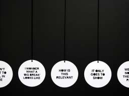 "I created my first disc pendants as a part of my major work in my third year (2014) in the Gold and Silversmithing workshop at the School of Art, ANU. I was trying to remove everything from the work except the text. This body of work was called “A Failure to Communicate, More or Less” and was a series of 14 white powder-coated aluminum disc pendants," says Zoe. Image: Zoe Brand
