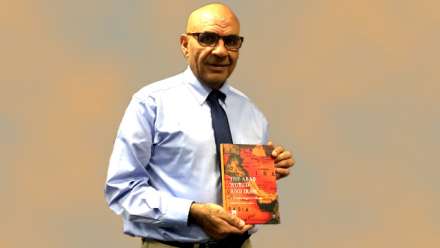  Professor Amin Saikal with his latest book, based on conference which marked the 20th anniversary of the ANU Centre for Arab and Islamic Studies.
 