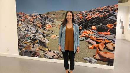  Ciara O'Brien with her work Life Jacket Graveyard.
 