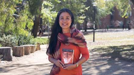  Dr Merlinda Bobis with her book Locust Girl. A Lovesong. 