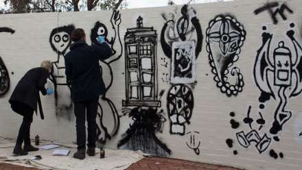  A wall outside the ANU School of Art was a giant canvas for visiting Year 10 students to make street art.
 