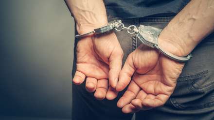 Image of man in handcuffs