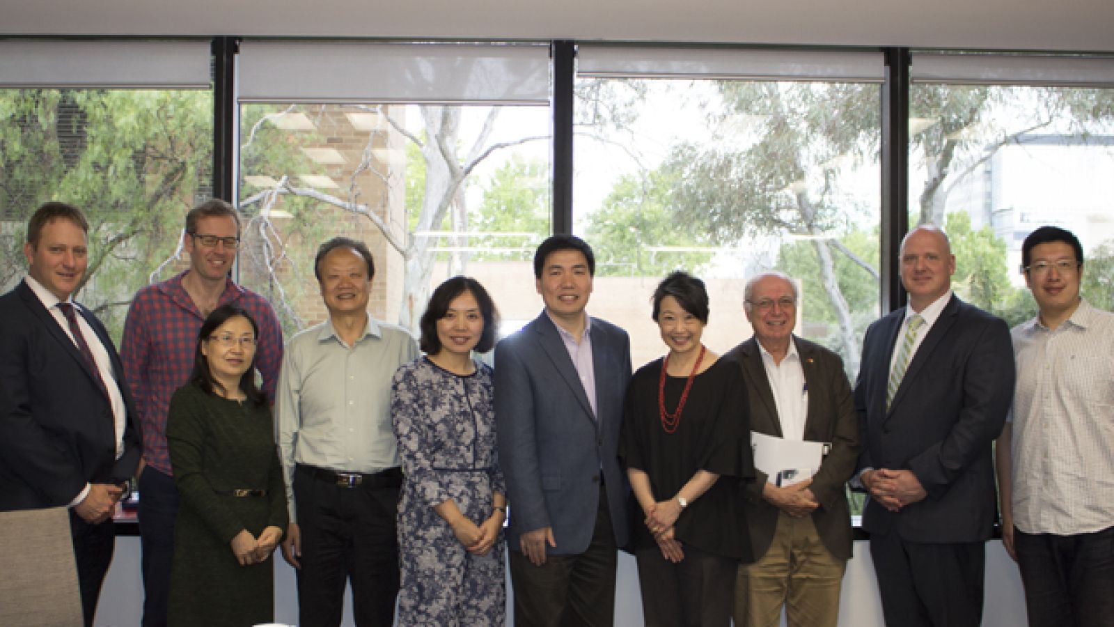 Officials from CASS and China's Xi'an Jiaotong University met at ANU to discuss potential research collaboration.