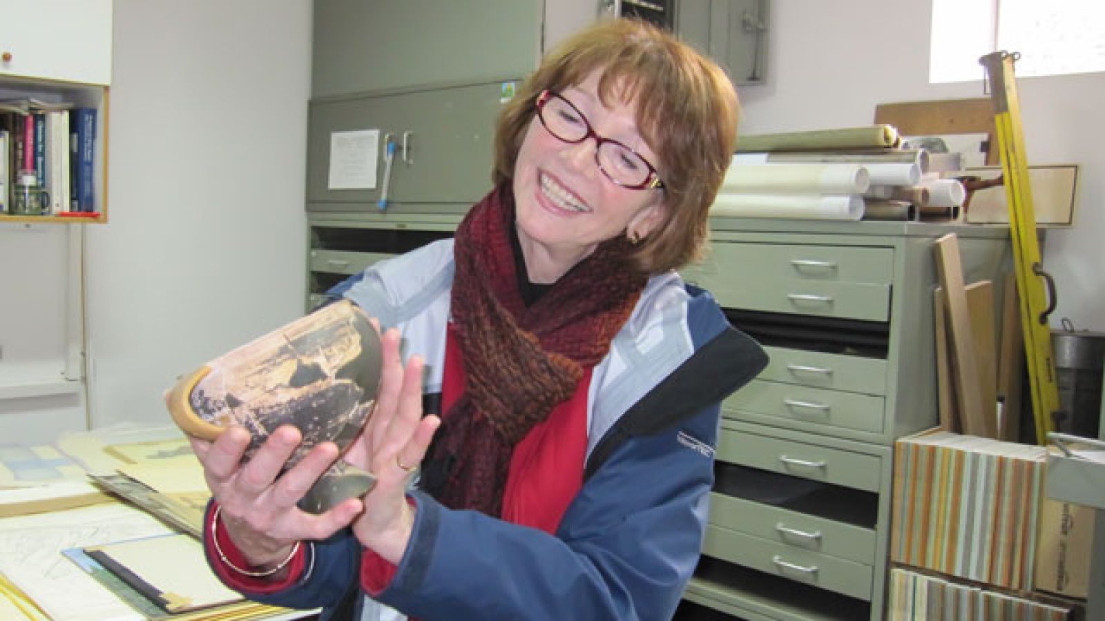  Elizabeth Minchin, here assessing an ancient vase, will have her name inscribed on the Roll of Professors Emeriti of the University.
 