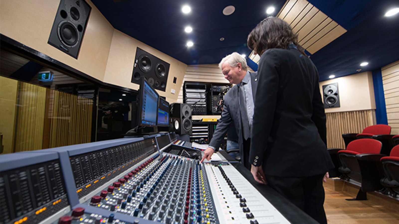 ANU Vice-Chancellor Professor Brian Schmidt AC pressing the record button on the new Neve console, accompanied by the School's Music Technology Convenor Associate Professor Samantha Bennett. Image: Stuart Hay